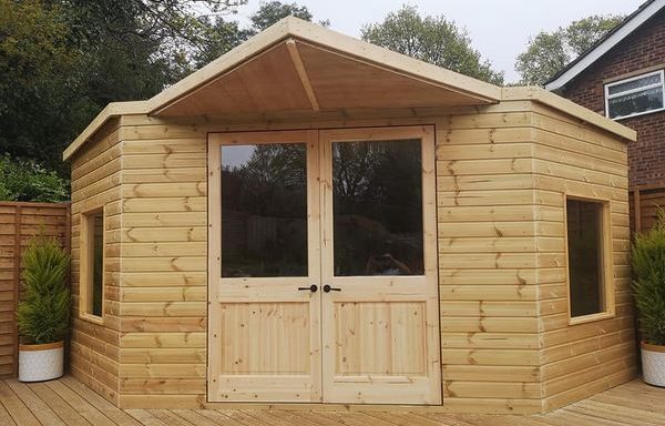 Timber built outbuilding or summer house